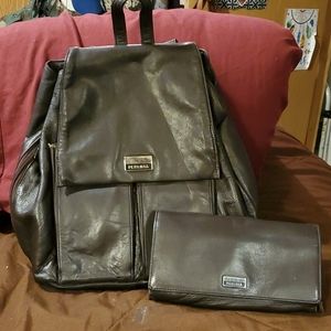 Peeling black leather backpack purse
